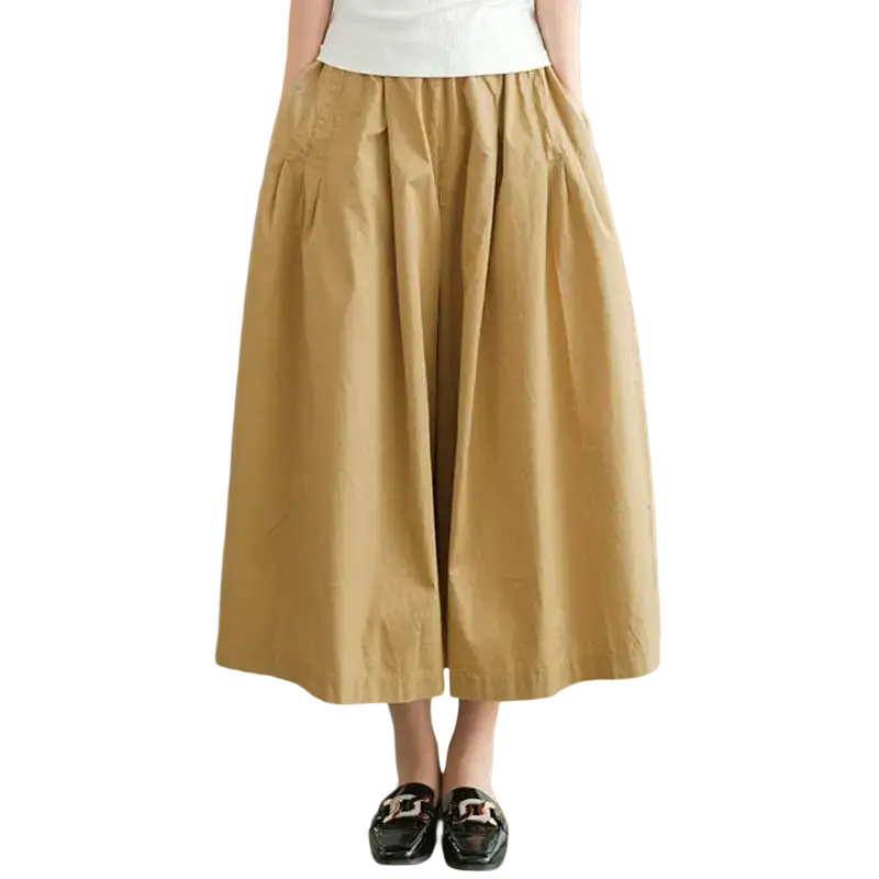 Tan wide leg cotton skirt pants with gathered waist and two front pockets for casual wear