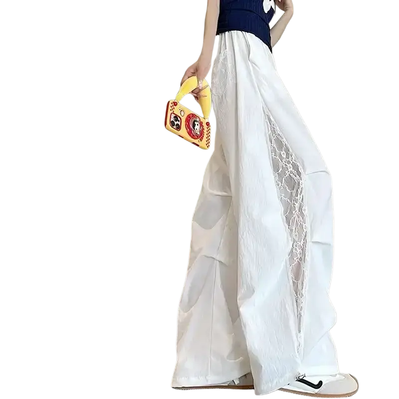 White wide leg pants with elastic waist and sheer lace side panels for elegant casual wear modname=ckeditor