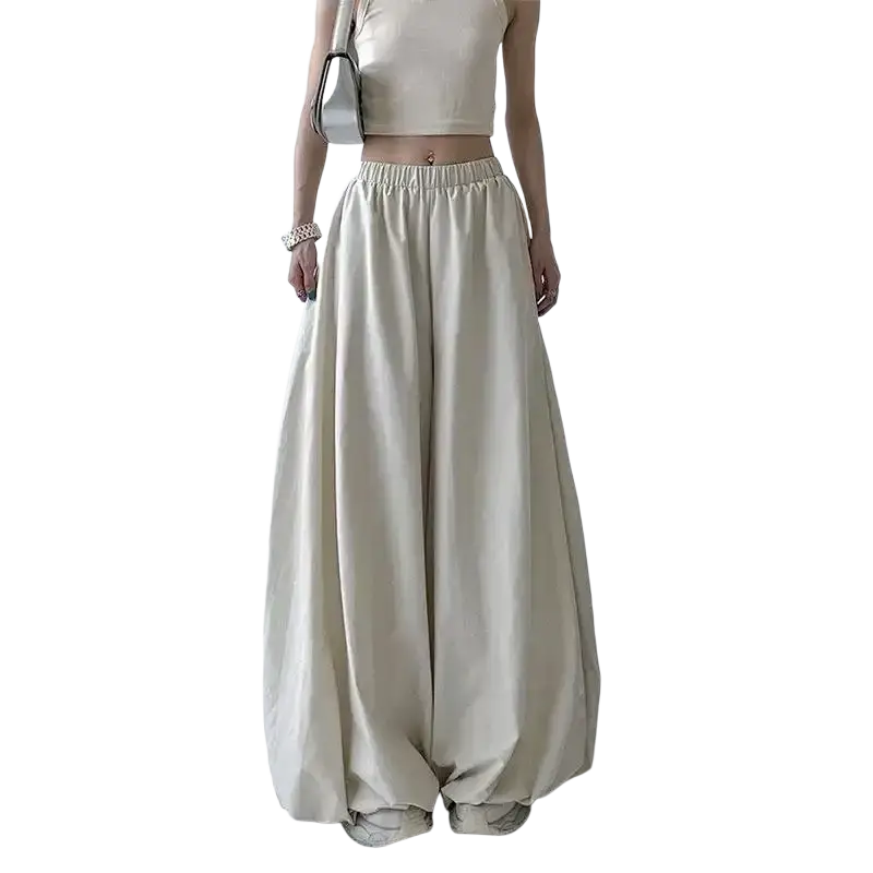 Cream-colored wide leg high waist flowy balloon trousers with elastic waistband and loose fit modname=ckeditor