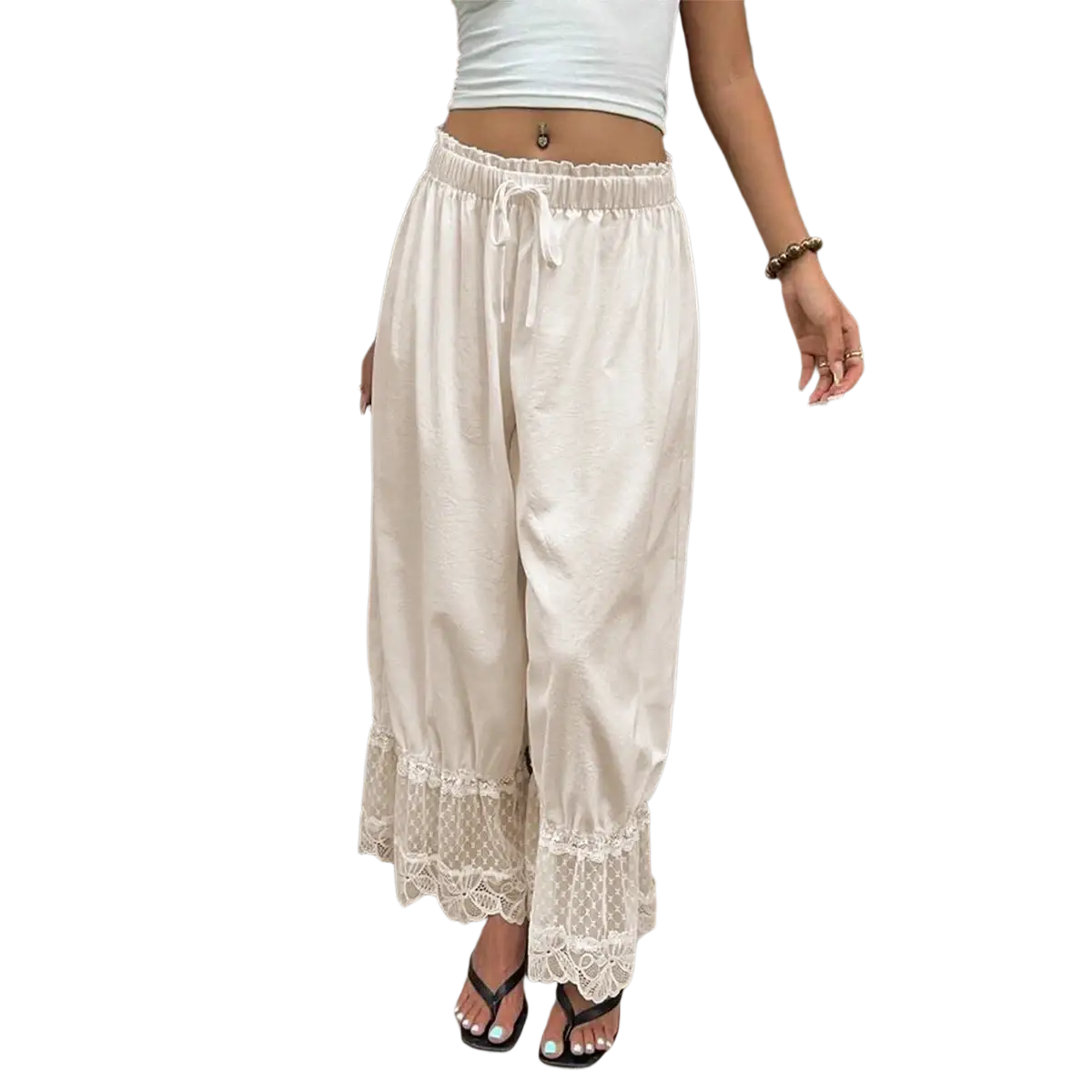 Cream-colored wide leg pants with lace trim at the hem and a drawstring waist for casual comfort