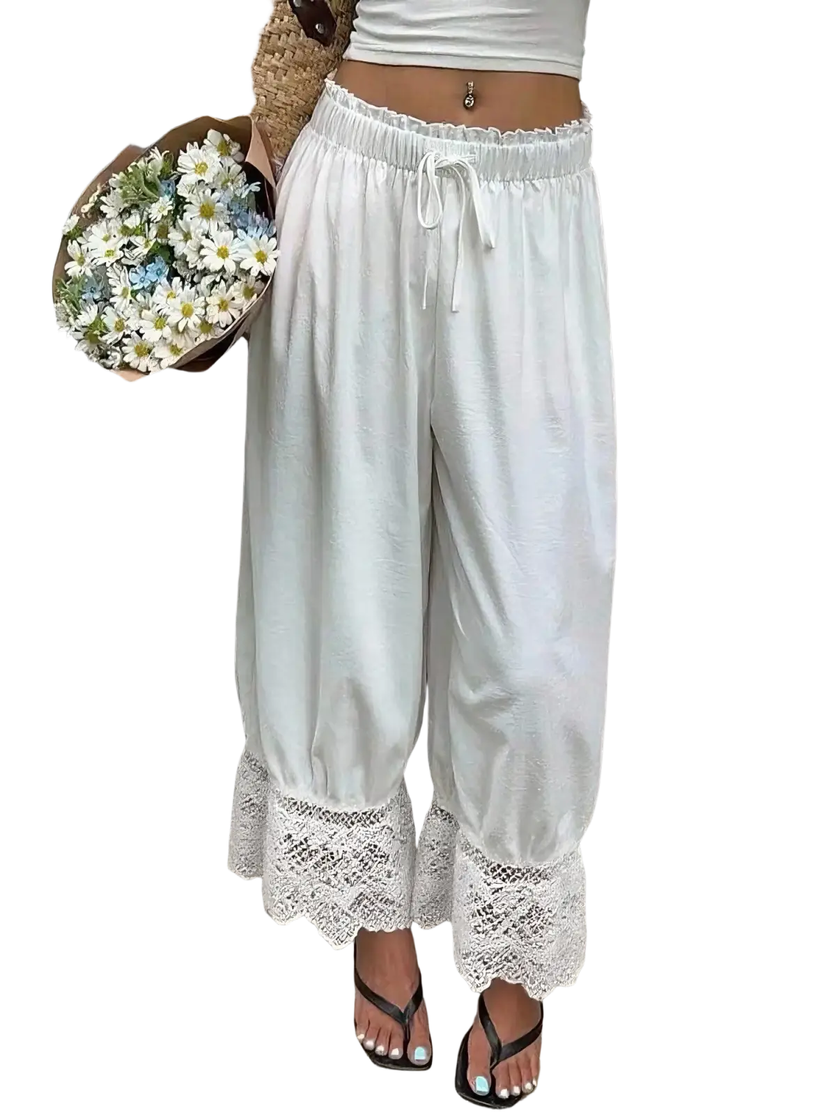 White cotton wide leg pants featuring delicate lace trim at the cuffs for casual and stylish wear