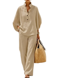 Beige linen two-piece set featuring a button-front top and wide leg pants for a versatile outfit