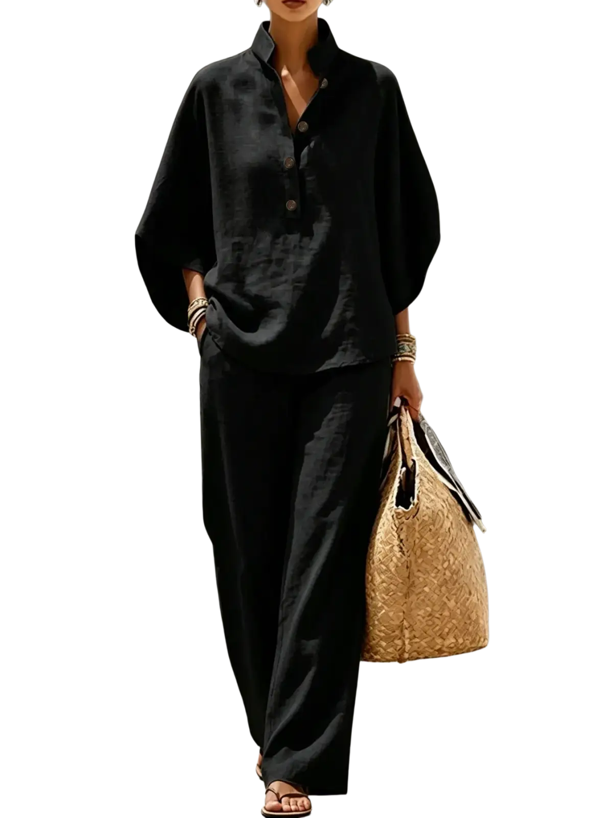 Black linen button-up shirt with wide sleeves and relaxed fit paired with wide leg pants for a versatile outfit