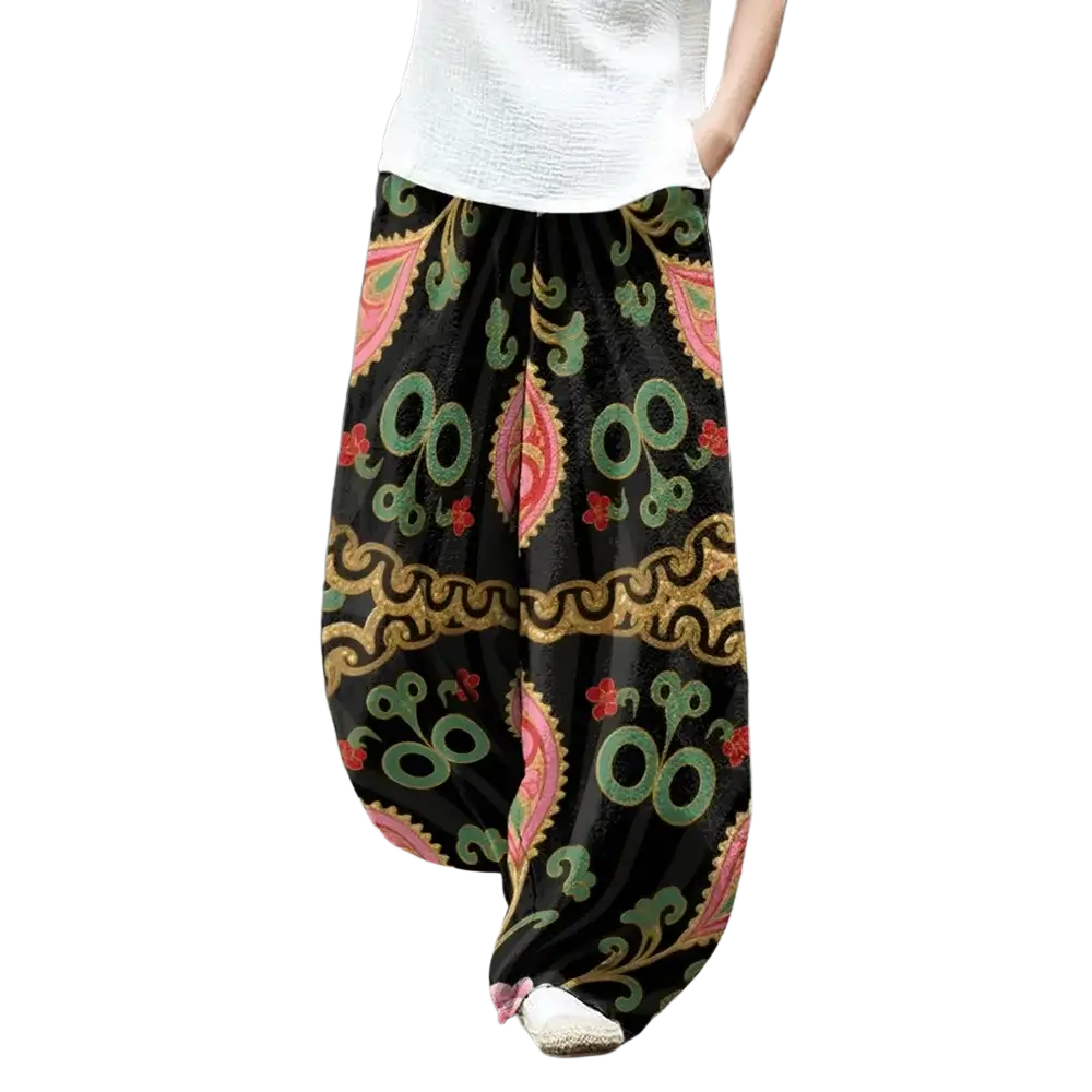 Black wide leg pants with vibrant pink green and gold paisley floral pattern offering stylish customer satisfaction