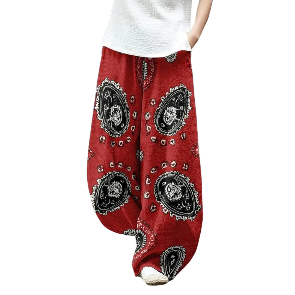 Red wide leg pants featuring black and white paisley patterns in a vintage blue leaf print boho casual style