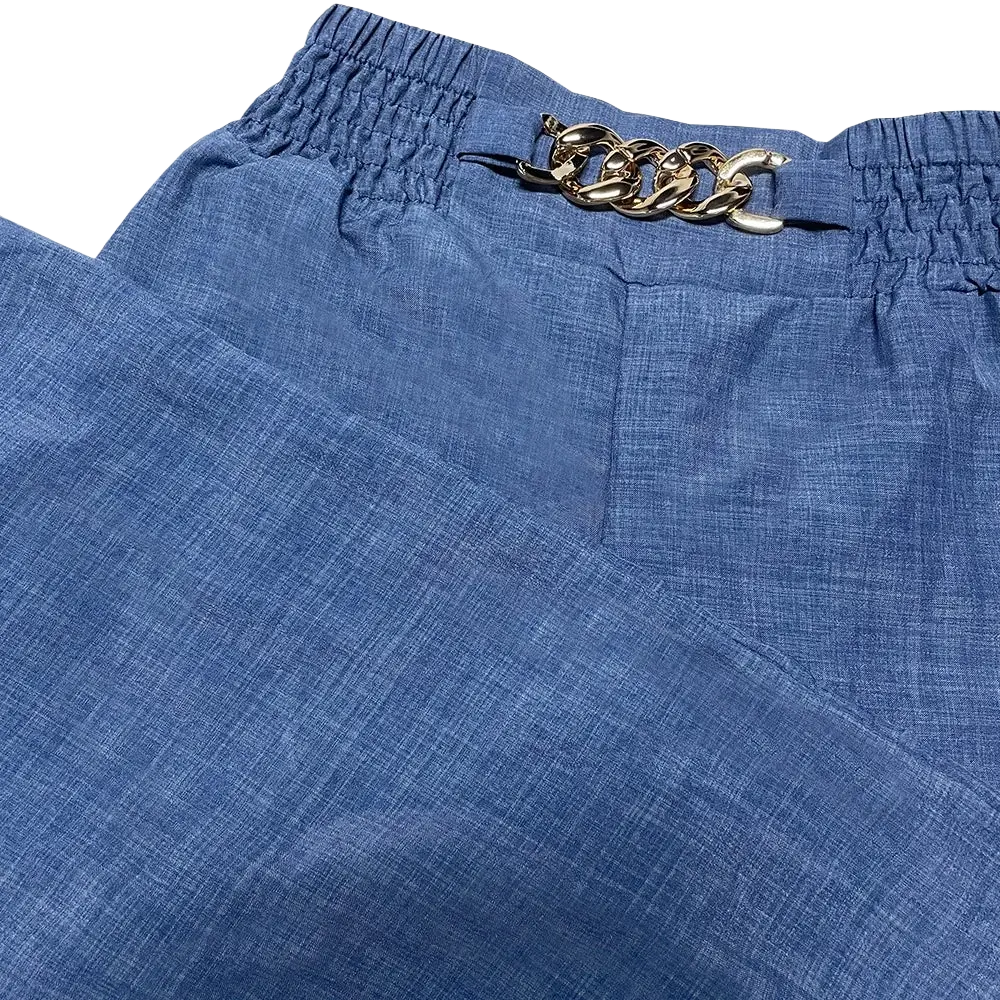 Blue denim wide leg pants for women featuring a gold-toned chain belt buckle perfect for casual office wear