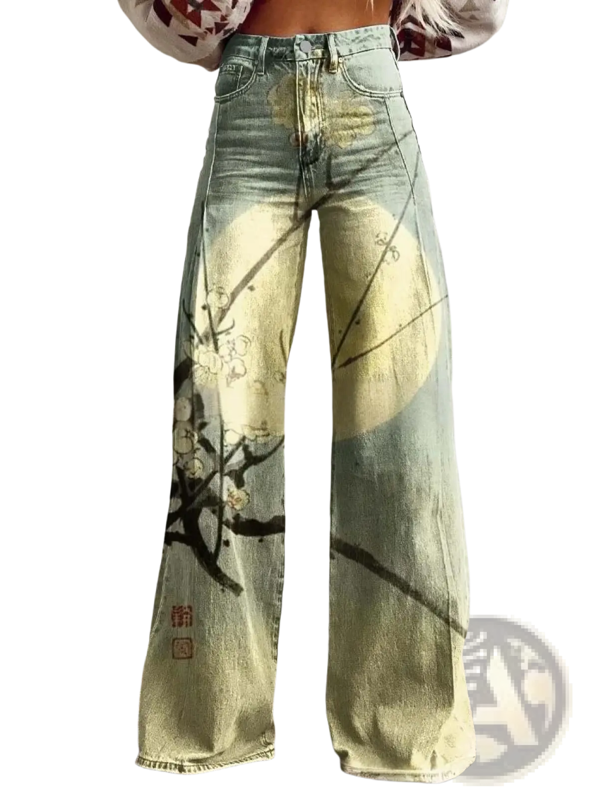 Wide leg printed denim jeans flared pants in faded green with a yellow moon, black branches, and white blossoms print