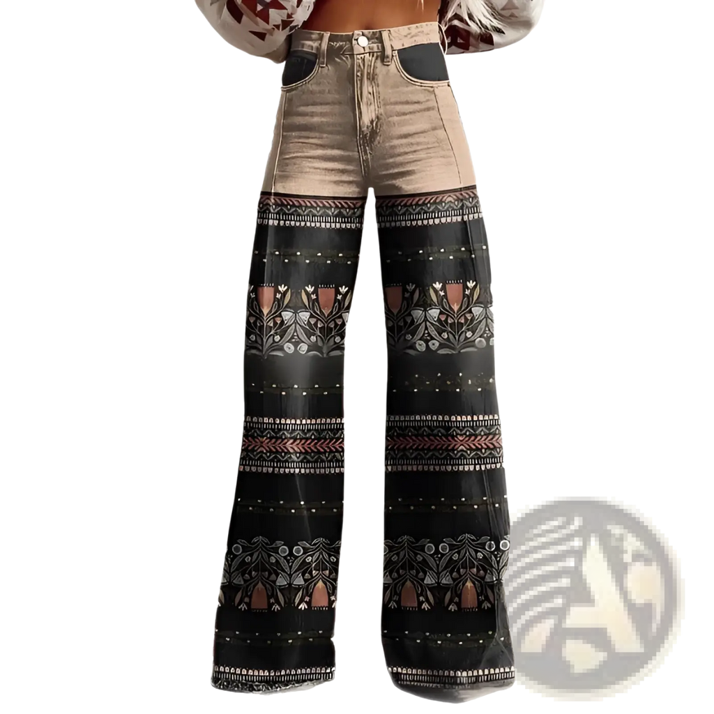 High-waisted wide leg printed denim jeans with faded beige upper and black floral and geometric patterned lower section