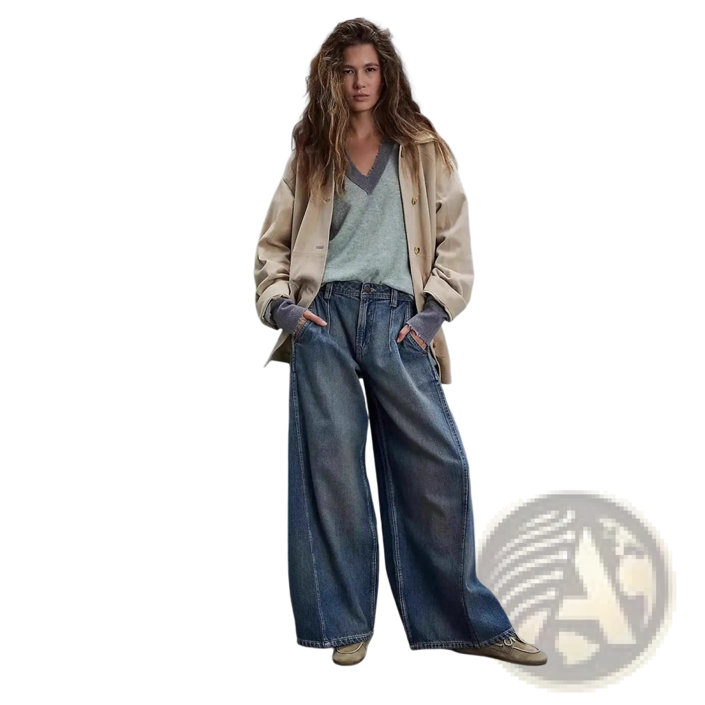 Wide leg retro denim jeans in medium-wash blue with visible stitching and frayed hems in vintage style