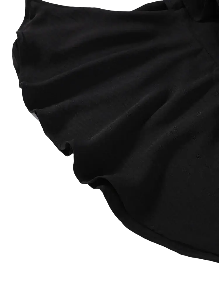 Wide leg black y2k streetwear pants with soft smooth fabric and gentle ruffled hem at the back side