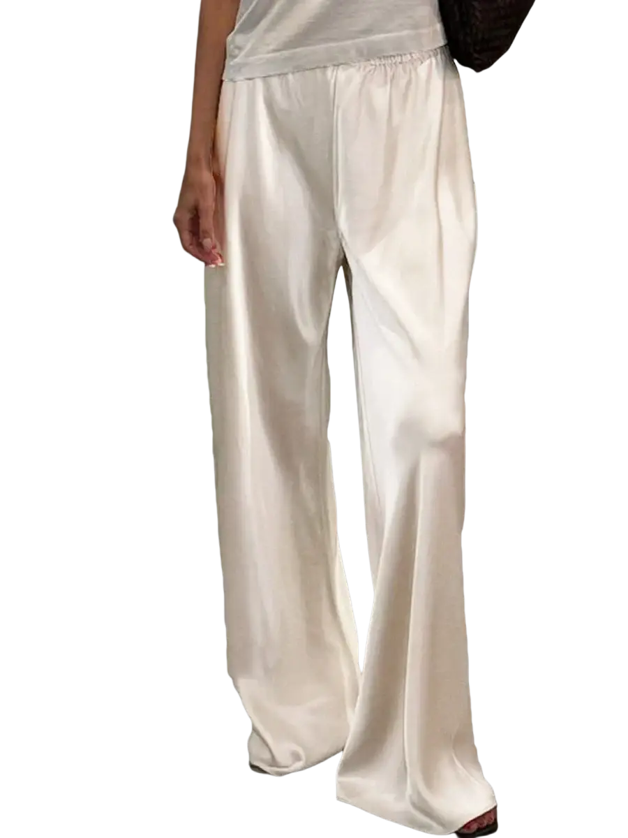 Wide leg satin pants in cream with elastic waist and relaxed pants length featuring a flowing silhouette