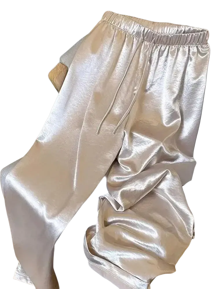 Wide leg shiny metallic silver satin pants for women with elastic waistband and drawstrings