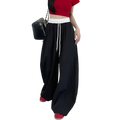 Black wide leg sweatpants for women with white elastic waistband and matching drawstring for casual comfort