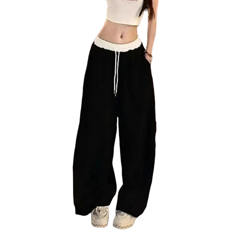 Black wide leg sweatpants for women with white elastic waistband and matching drawstring for comfortable wear