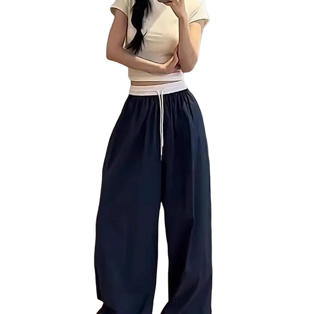 Navy blue wide leg sweatpants for women with white drawstring waistband designed for comfort and casual wear