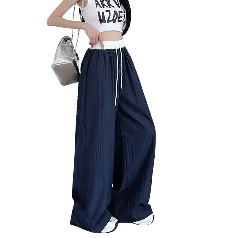 Navy blue pleated wide leg sweatpants for women with white waistband and drawstring for casual comfort