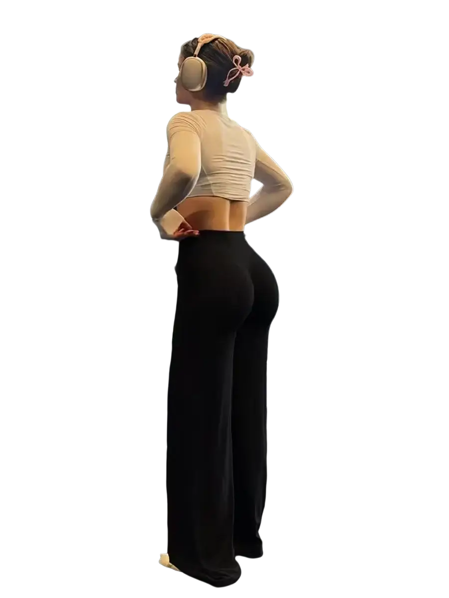 Black high waist wide leg workout leggings with smooth, form-fitting material and subtle side seam detailing