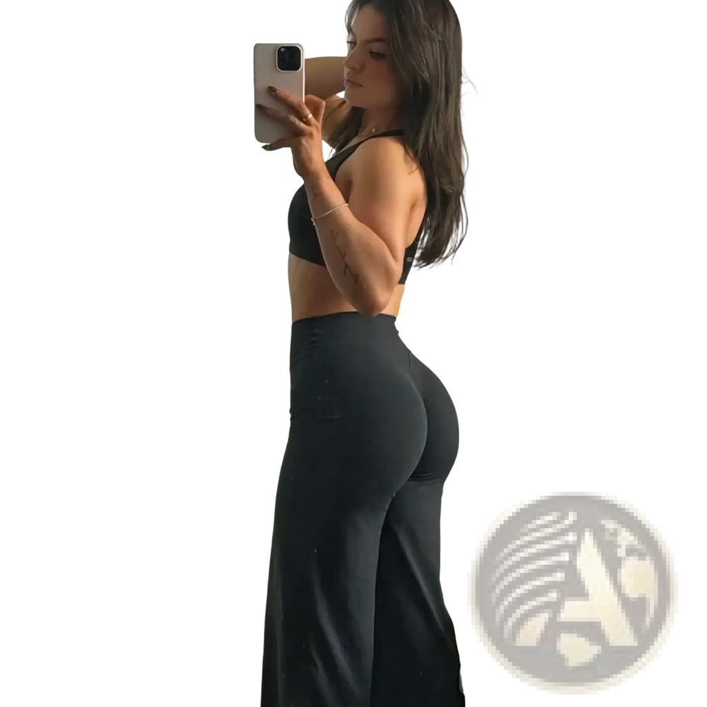 Black high-waisted wide leg workout leggings with smooth form-fitting material and subtle side seam detailing