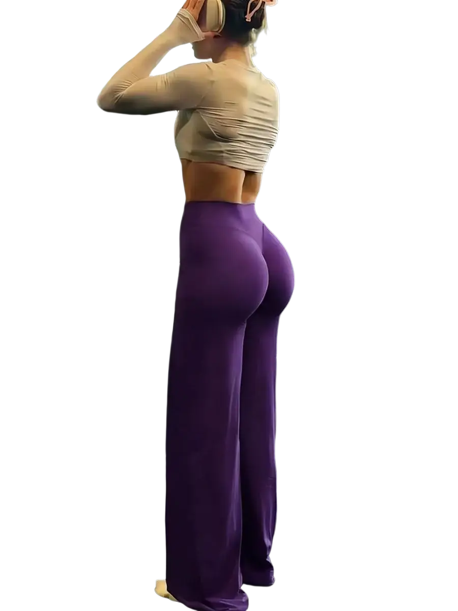 Purple high-waisted wide leg workout leggings made of smooth stretchy fabric for fitness and exercise use