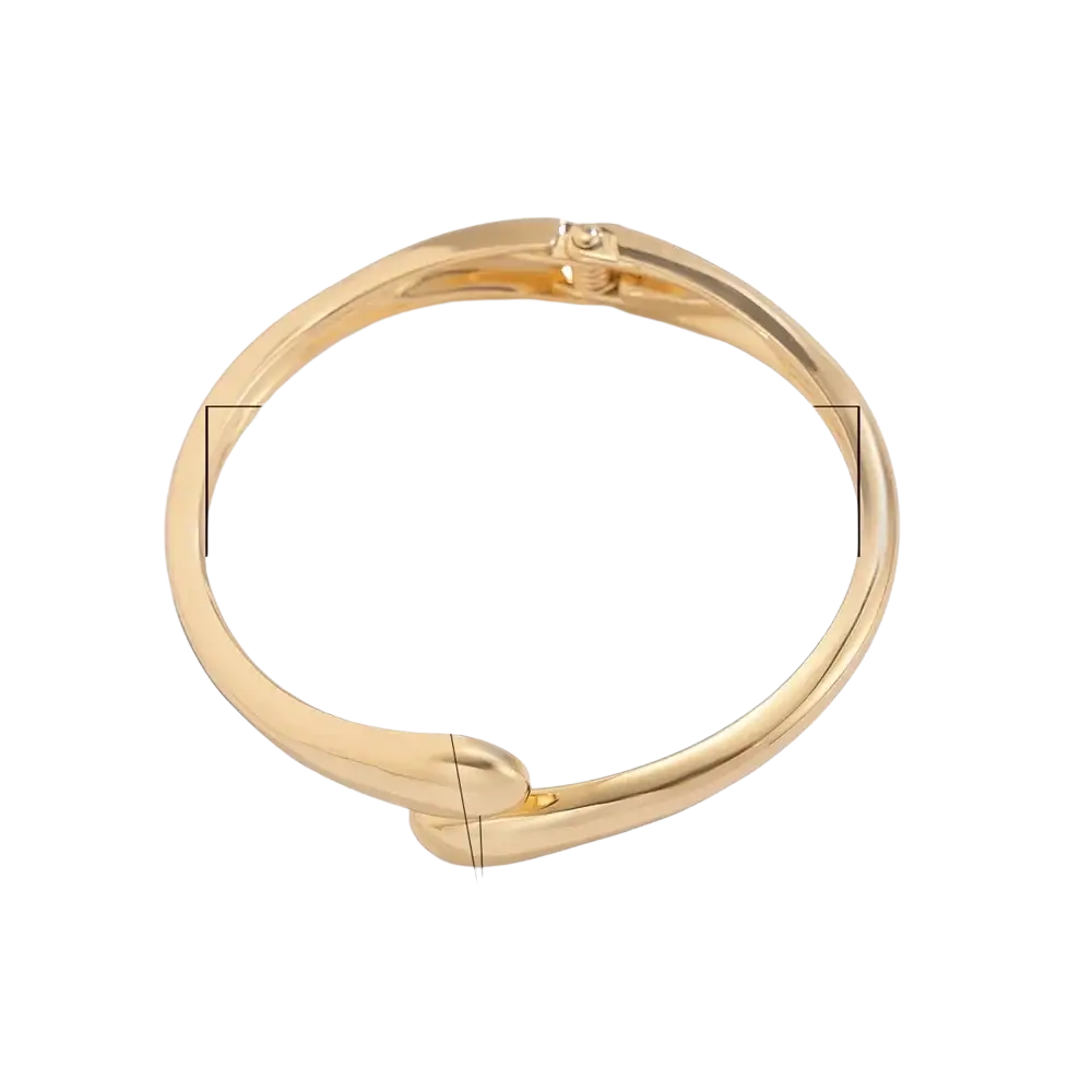Wide metal bangle gold toned chunky open cuff bracelet with smooth curved design and secure clasp mechanism