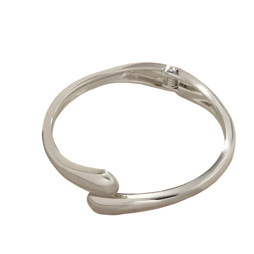 Silver color chunky wide metal bangle with sleek curved design and spring-loaded clasp in metal bangle ring style