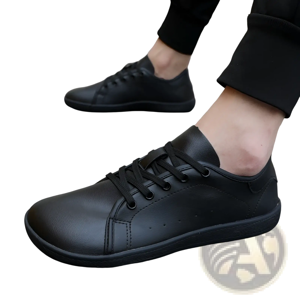 Black leather wide toe low-top sneakers with matching laces minimalist non slip design for casual wear