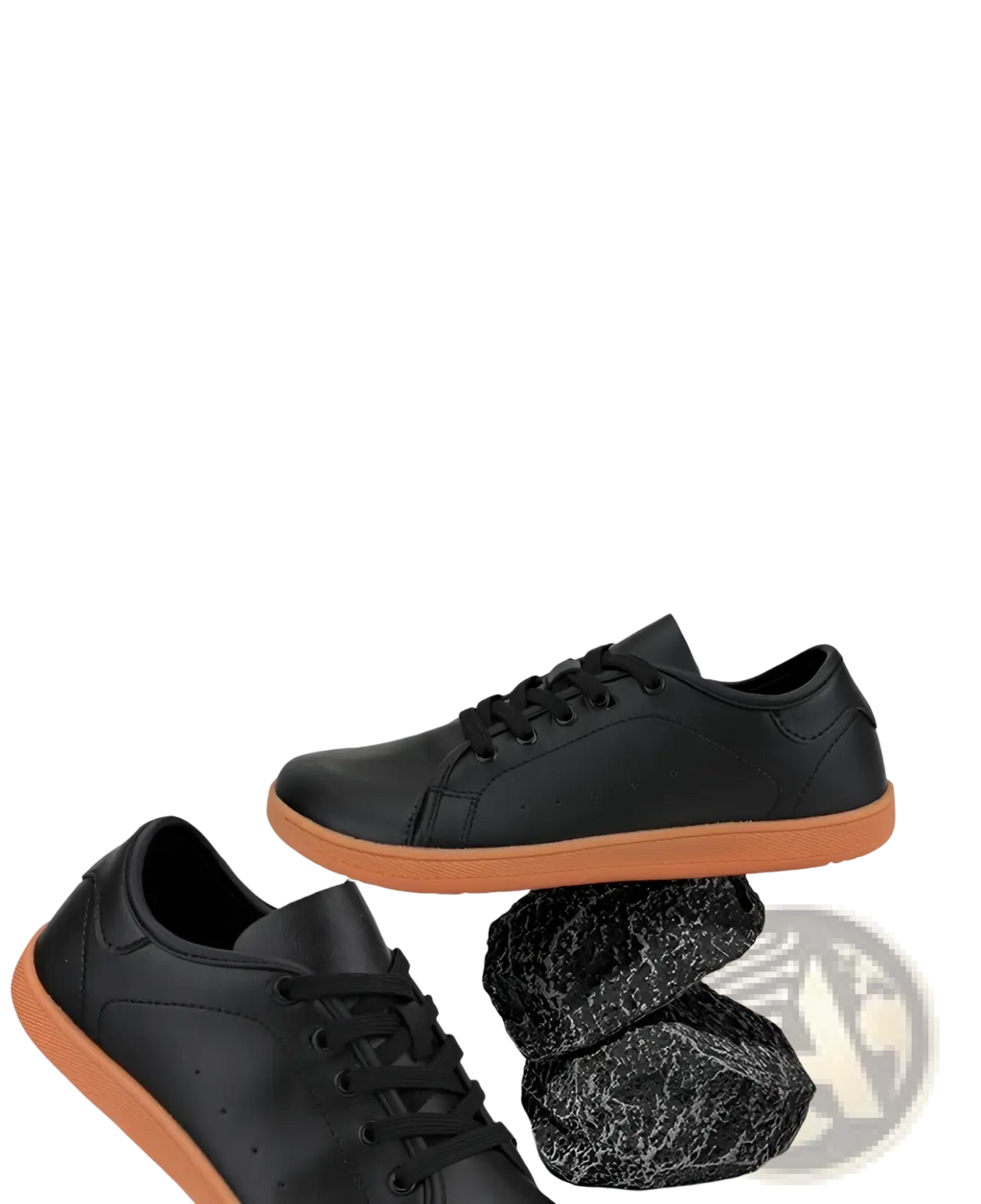 Black leather low-top wide toe minimalist sneakers with orange non slip sole for comfortable everyday wear