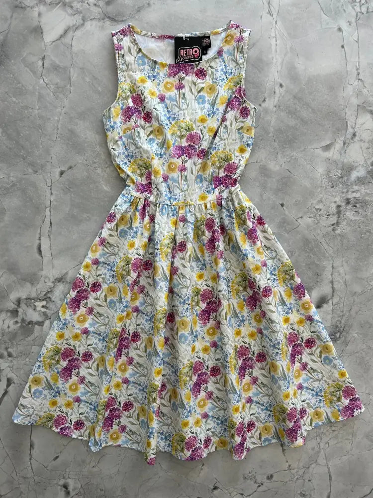 Wildflower vintage 1950s sleeveless cotton midi dress with fitted waist floral print in purple yellow and blue on cream background