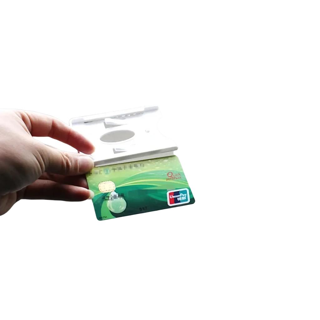 White plastic windshield card holder gripping a green unionpay credit card for auto parking tickets