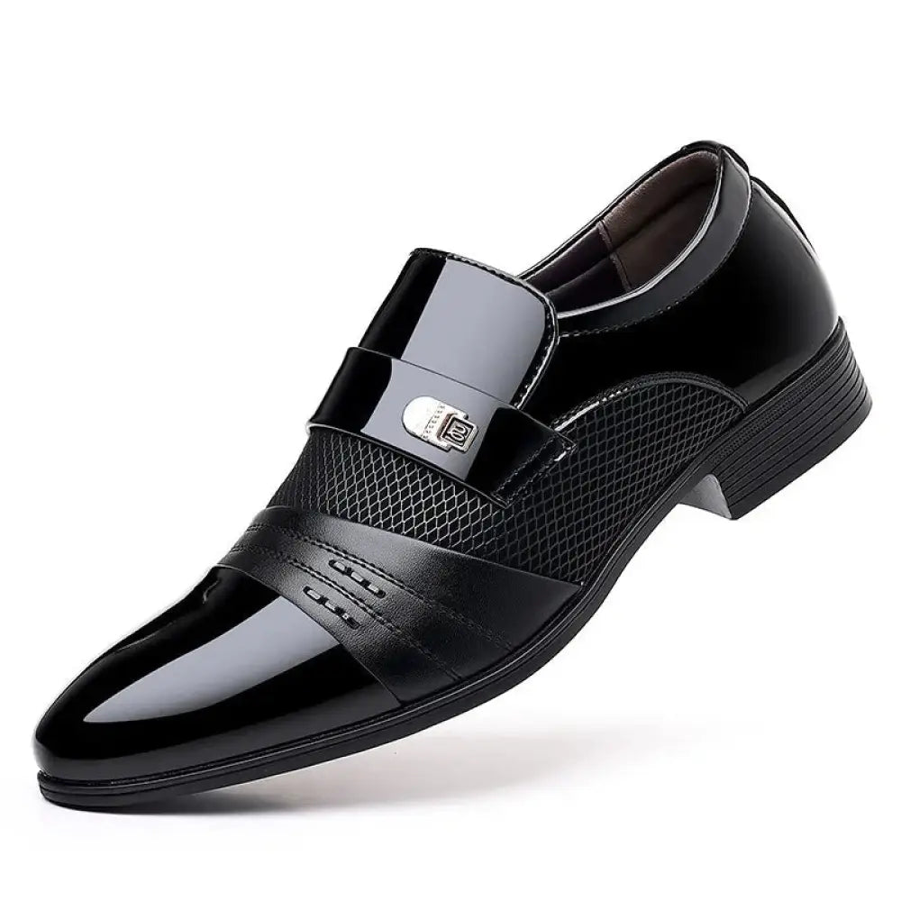 Men’s wine red patchwork leather dress shoe with glossy black patent leather, mesh panels, and silver buckle detail