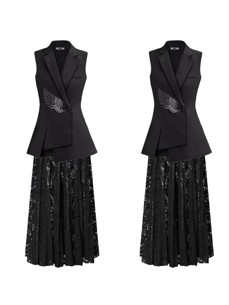 Black sleeveless blazer with silver wing embellishment paired with black sequined pleated skirt elegant evening wear