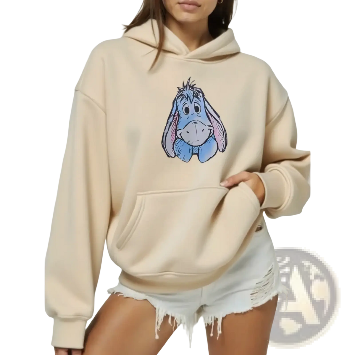 Beige fleece hoodie featuring a printed illustration of eeyore from winnie the pooh on the front