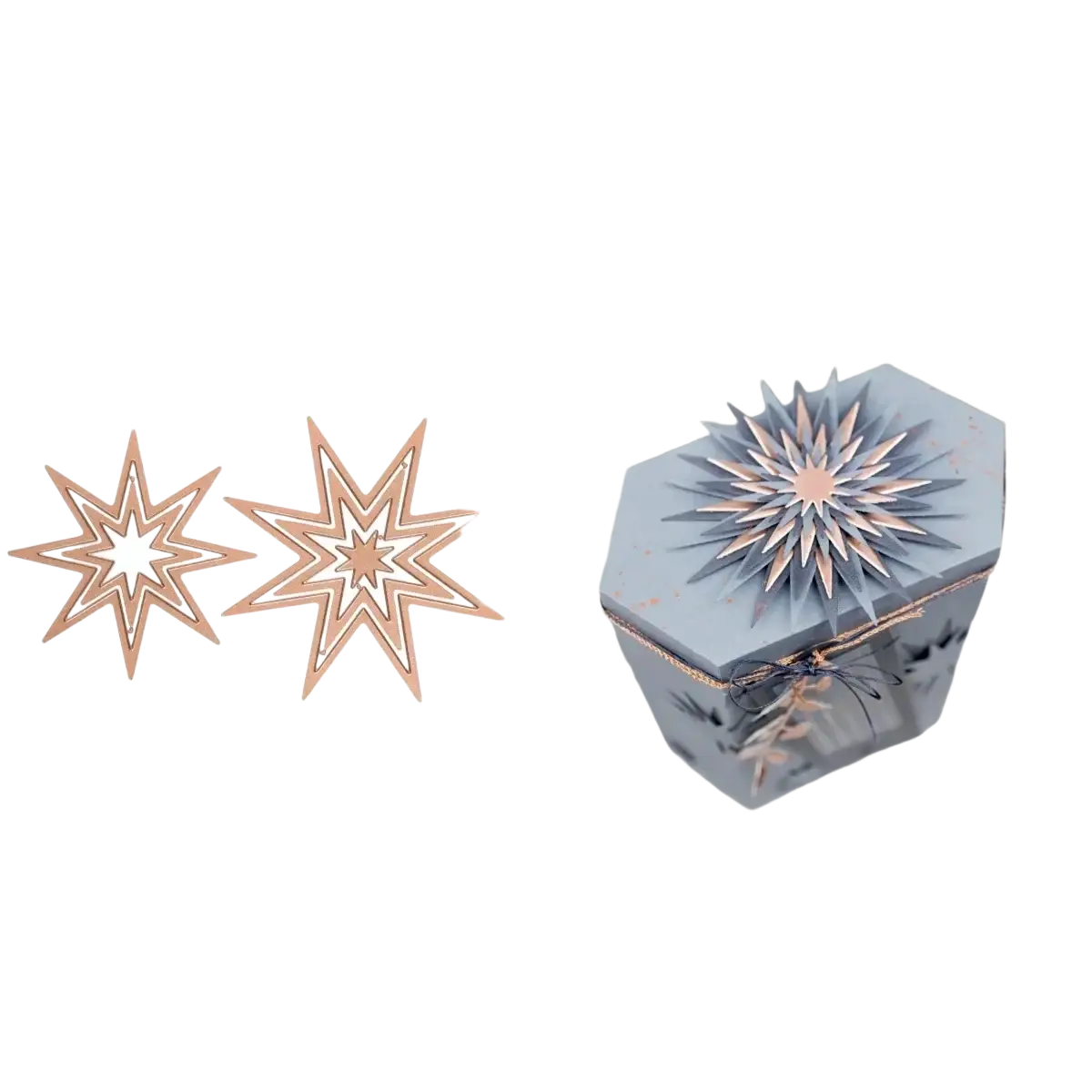 A delicate multi-layered star-shaped winter animal metal cutting die in rose gold and light blue for scrapbooking