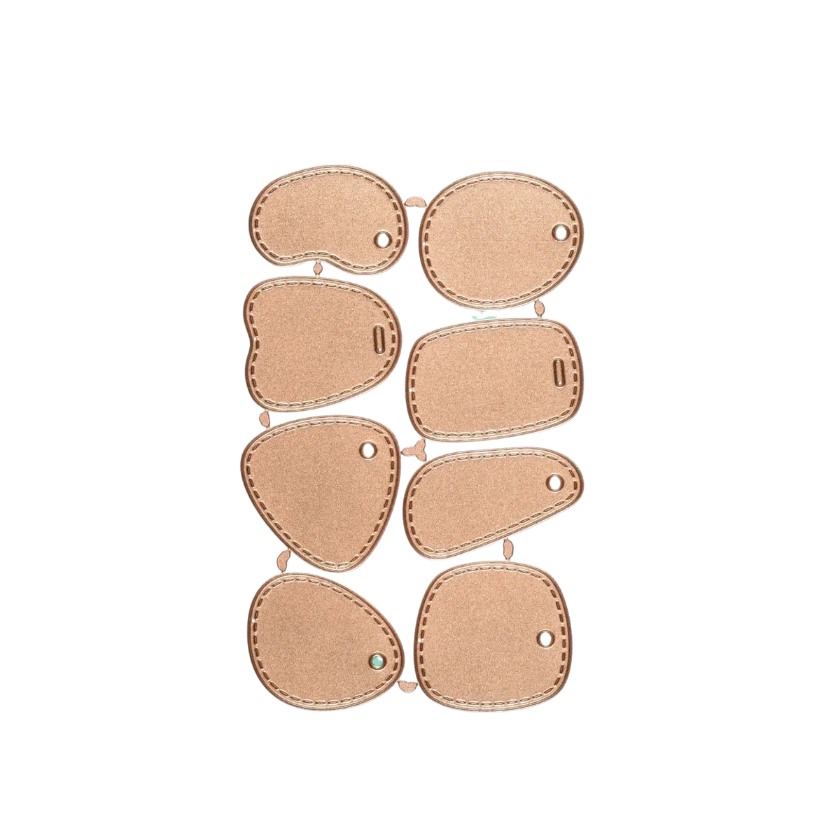 Set of eight rose gold leather tag cutouts with stitched edges and punched holes for winter animal scrapbooking dies
