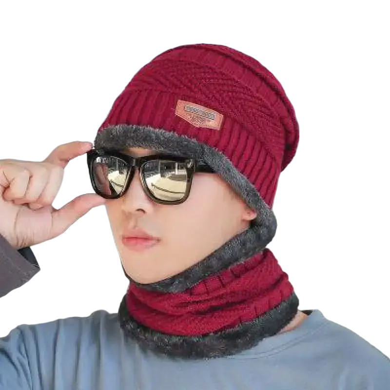 Red knitted winter beanie with gray fleece lining and brown leather patch available on the official website