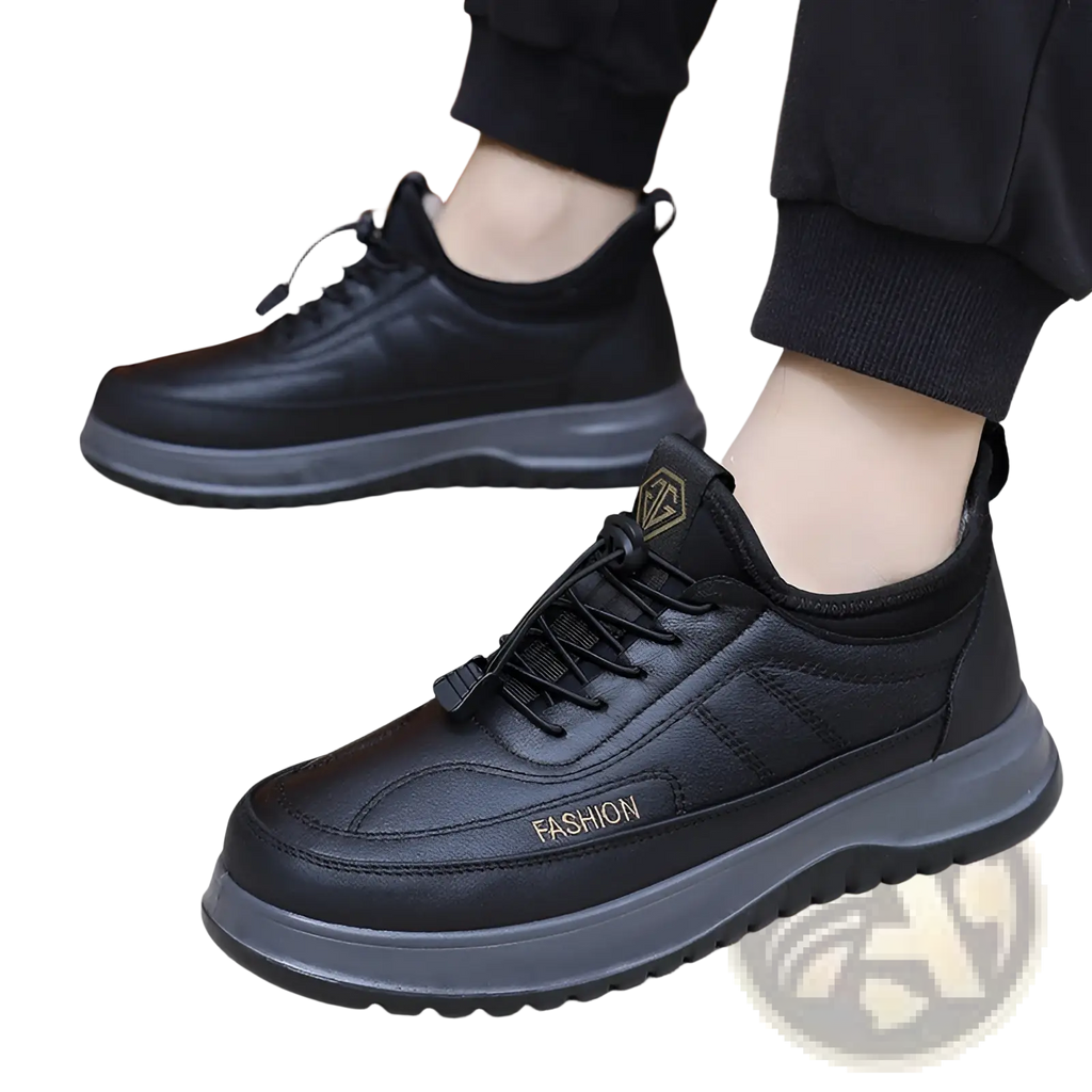 Winter fleece lined leather sneakers for men in black with thick gray rubber sole and gold fashion branding on the side