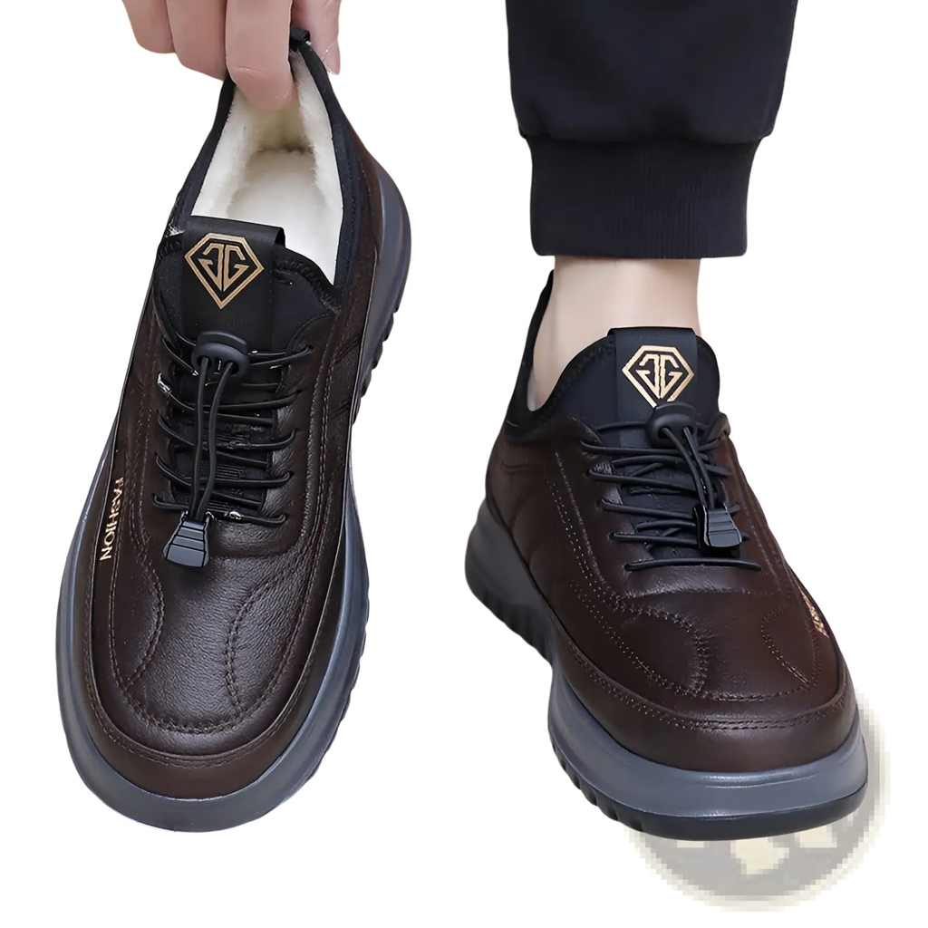Winter fleece lined leather sneakers for men in brown with black laces thick gray sole and gold logo accents on the tongue