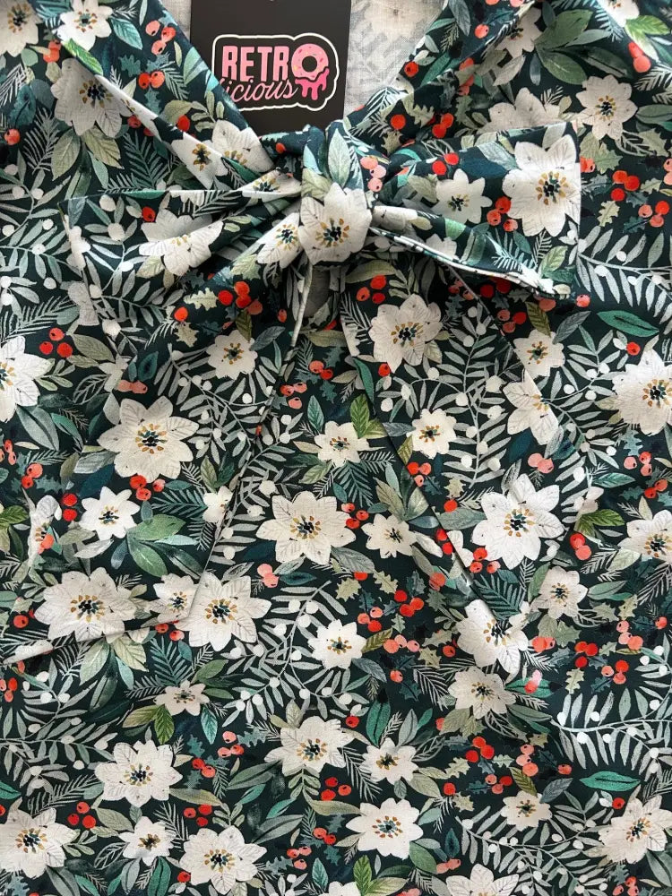 Dark green floral patterned sleeveless cotton blouse with white flowers and red berries for winter wear