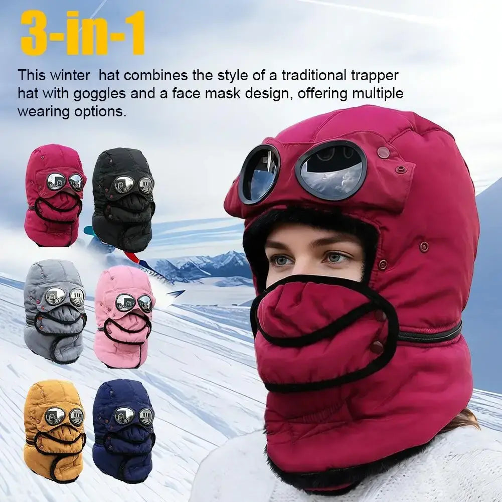 A vibrant pink quilted 3-in-1 trapper winter hat with integrated face mask and goggles for cold weather protection
