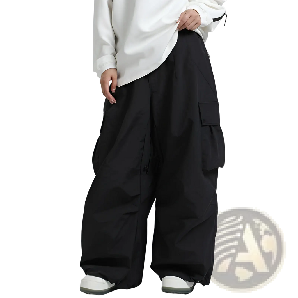 Black wide-leg winter outdoor loose ski pants with large side pockets and a relaxed utilitarian design