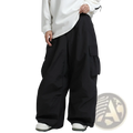 Black wide-leg winter outdoor loose ski pants with large side pockets and a relaxed utilitarian design