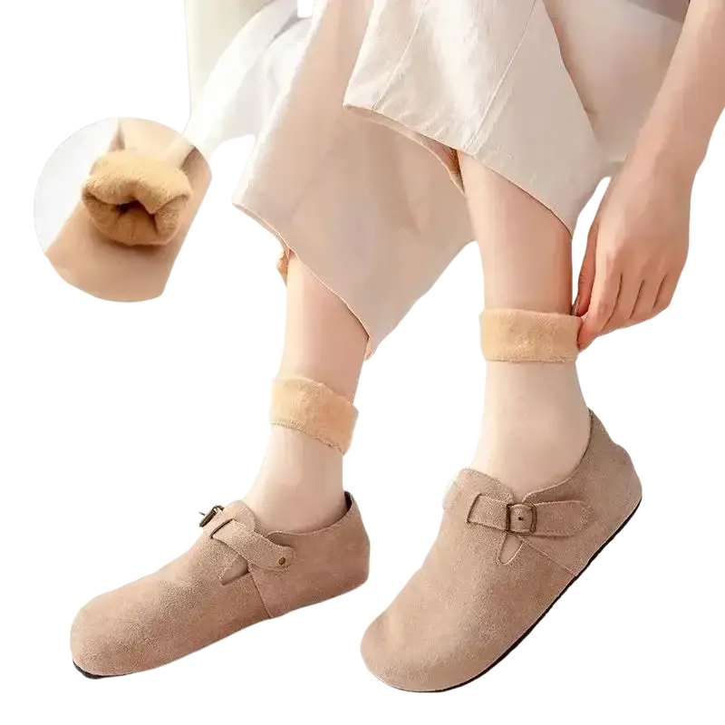 Beige suede mary jane shoes with buckle strap and soft fuzzy lining paired with winter thermal socks cashmere wool