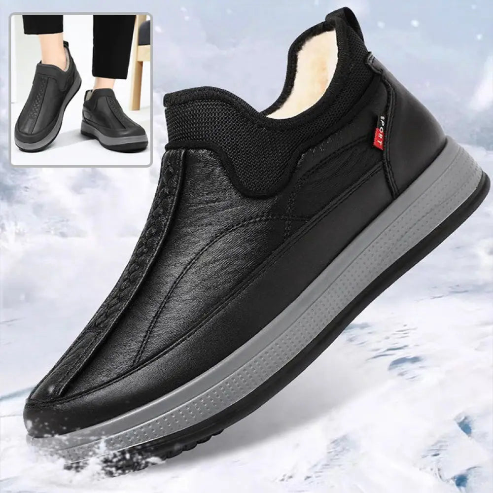 Men’s black fleece lined slip on winter snow boots with plush white lining and gray rubber sole for cold weather
