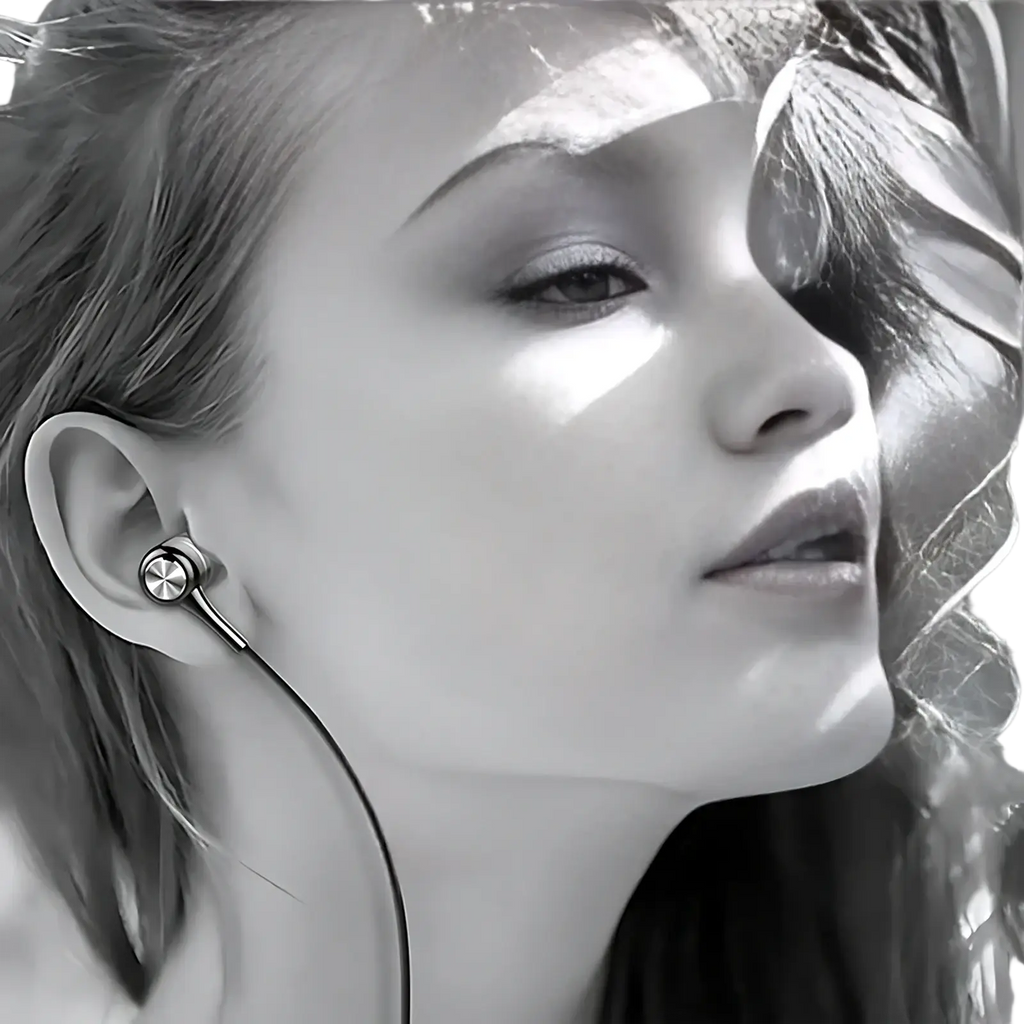 Silver wired earbuds hifi bass headset with mic featuring a sleek metallic finish and thin cable for clear audio