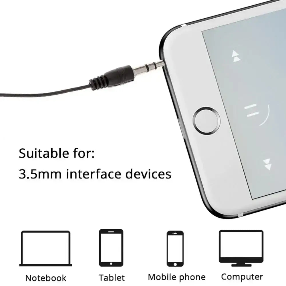 Black 3.5mm wired headphones with male connector plugged into white smartphone for mp3 mp4 devices use
