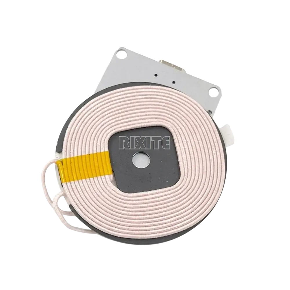 A circular light pink coiled wire wireless charger 15w fast charging type c module with 12v input and rixite logo