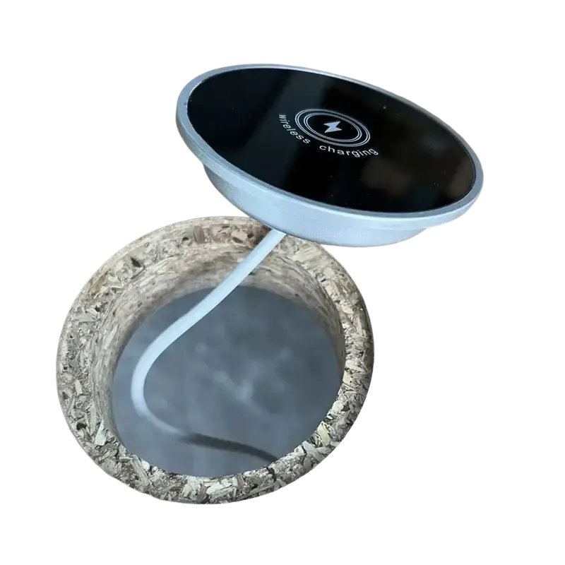 A sleek black glossy wireless charger with light gray rim 15w magnetic wireless fast charging desktop pad