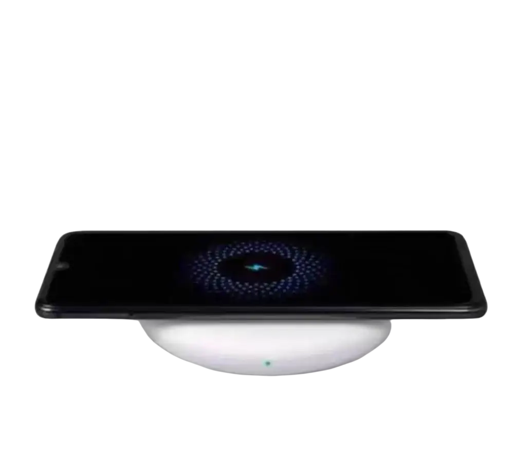 A sleek black smartphone on a white wireless charger 20w fast charge pad with illuminated blue charge indicator for Xiaomi pro max