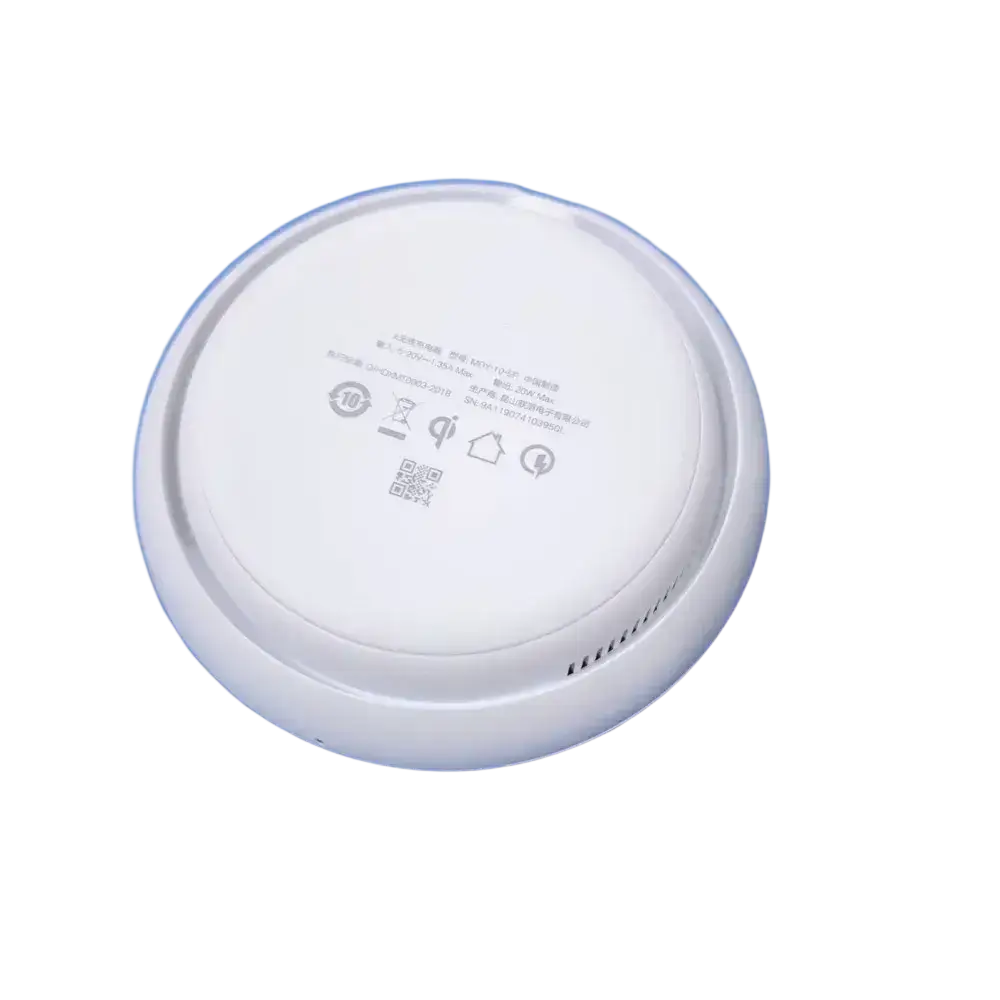 Back side of white circular wireless charger with blue rim and certification labels for 20w fast charge pro max use
