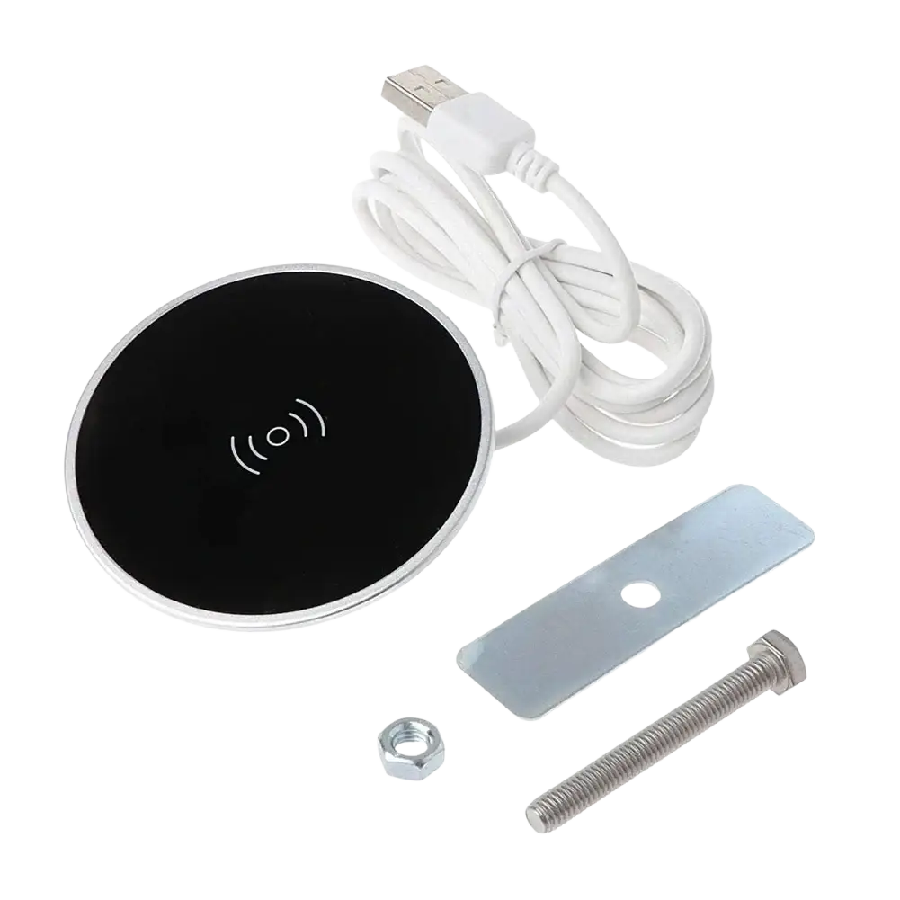 Black circular wireless charger with silver metallic rim and built-in fast charging desktop pad with white usb cable